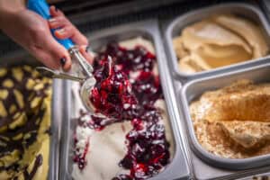 Ice cream with berry topping, served at Angelo's Restaurant.
