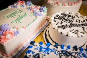 Delicious birthday cakes with colorful frosting and musical notes, perfect for special occasions at.