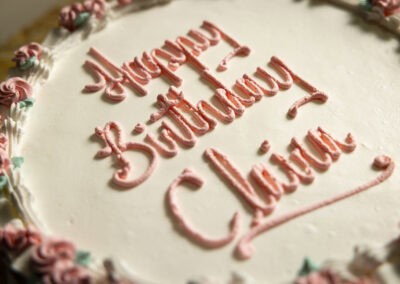 Happy Birthday Cake Cake with "Happy Birthday" message in pink icing.