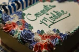 Decorated cake with "Congratulations" message for a special celebration.