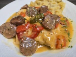 Delicious meatballs with fresh vegetables served with creamy mashed potatoes.