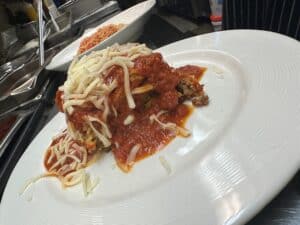 Delicious homemade meat lasagna with cheese and tomato sauce at Angelo's Restaurant.