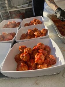 Authentic Italian meatballs served with rich marinara sauce, perfect for a delicious meal.