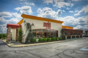 Angelo's Restaurant building with large windows and welcoming entrance.